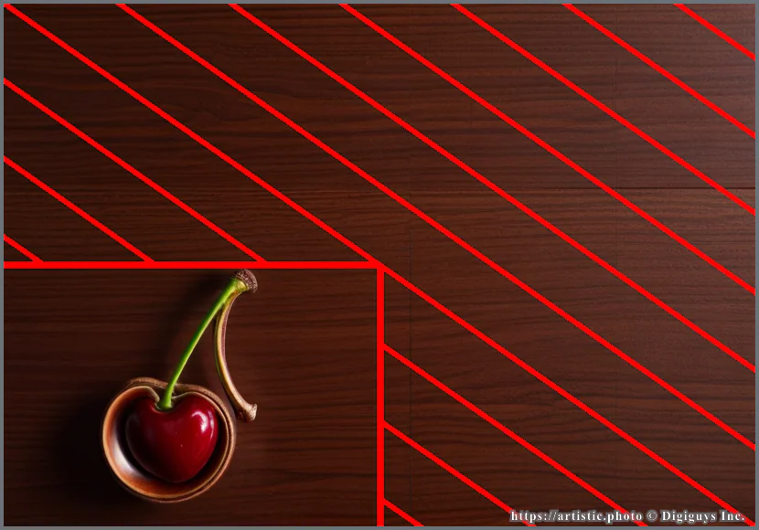 Negative Space composition — cherry on wood surface with empty area